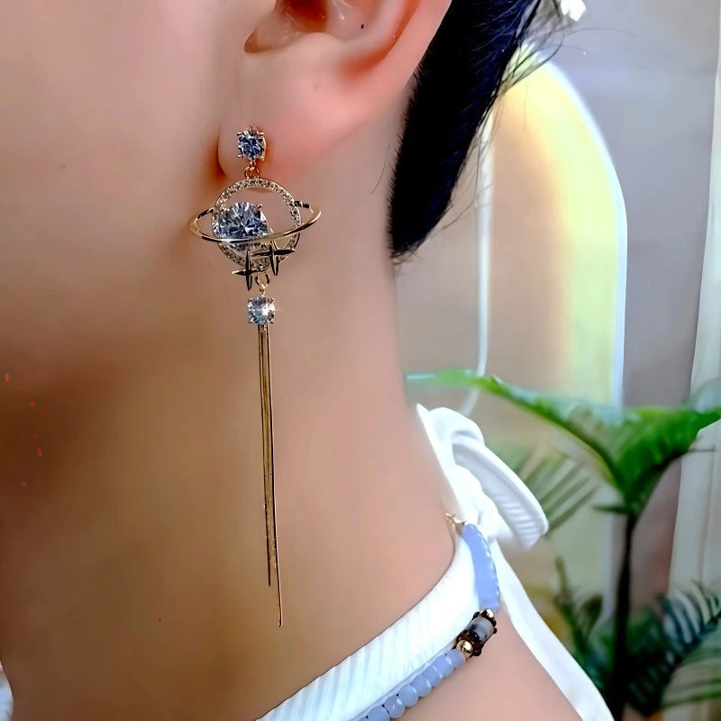 Close-up detail of the sparkling zircons and plating on the Celestial Tassel Earrings