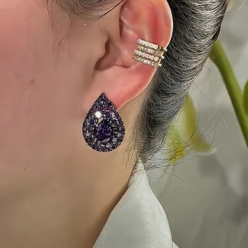 Model showcasing the dangle and style of the 14K Gold-Plated Zircon Diamond Water Drop Earrings