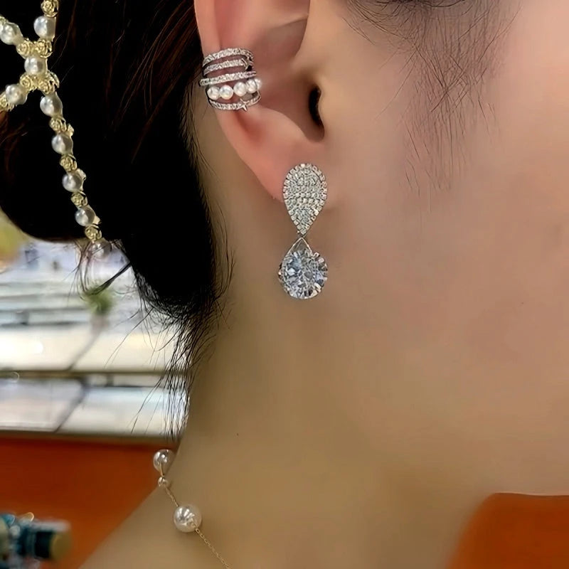 Close-up detail of the sparkling zircons and plating on the Silver Water Drop Earrings