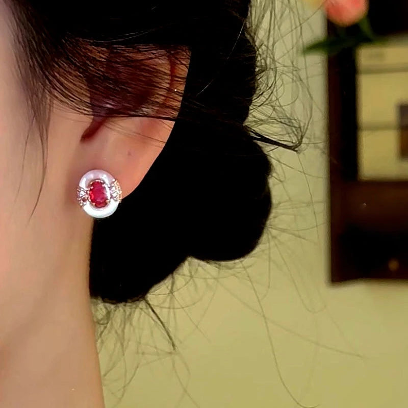 Angled view of the 14K Gold-Plated Zircon Dimond Lady Windsor Stud Earrings