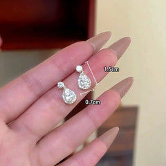 Angled view of the 14K Gold-Plated Zircon Dimond Water Drop Earrings