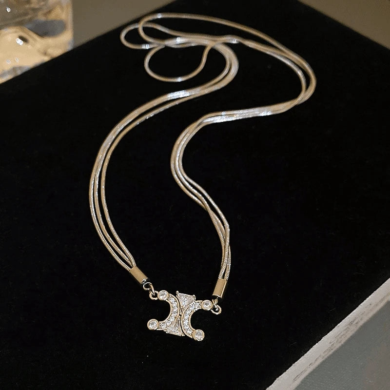 14K Gold-Plated Zircon Double C Magnetic Necklace worn to showcase its length and pendant detail