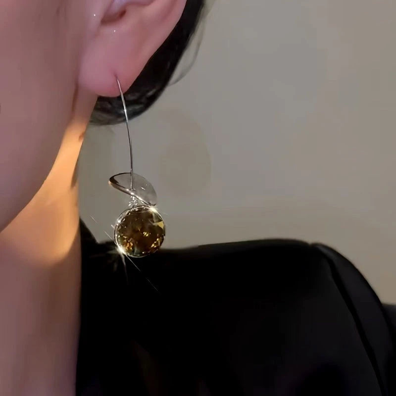 Close-up detail of the sparkling zircons and plating on the Zircon Ear Hooks