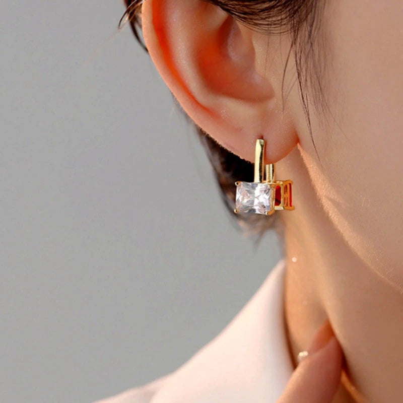 Close-up detail of the sparkling zircons and plating on the Cherry Tassel Earrings