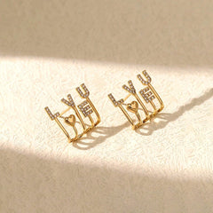 Close-up detail of the sparkling zircons and plating on the Lucky Clover Studs