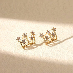 Model showcasing the dangle and style of the 14K Gold-Plated Zircon Elegant Studs