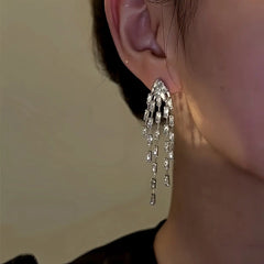 Close-up detail of the sparkling zircons and plating on the Firework Tassel Earrings