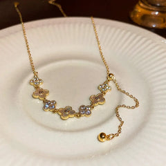 Detailed view of the 14K Gold-Plated Zircon Flour Leaf Adjustable Necklaces chain and pendant