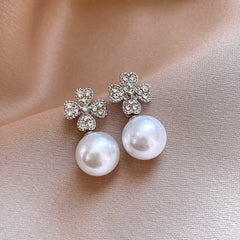 Close-up detail of the sparkling zircons and plating on the Flower Bead Earrings
