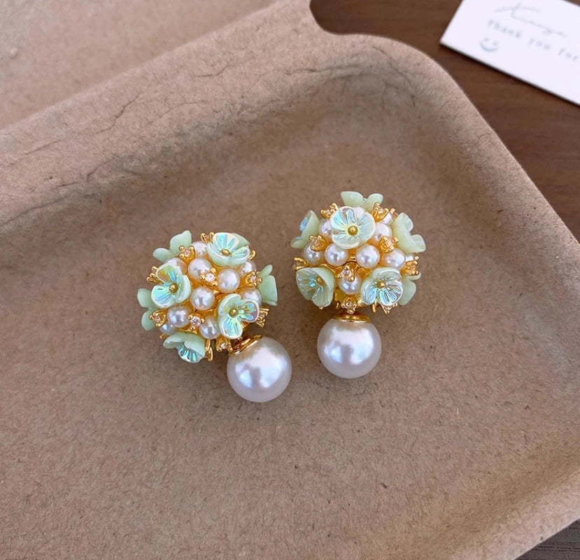 Styling the Pink Flower Ear Jackets for a chic and modern look