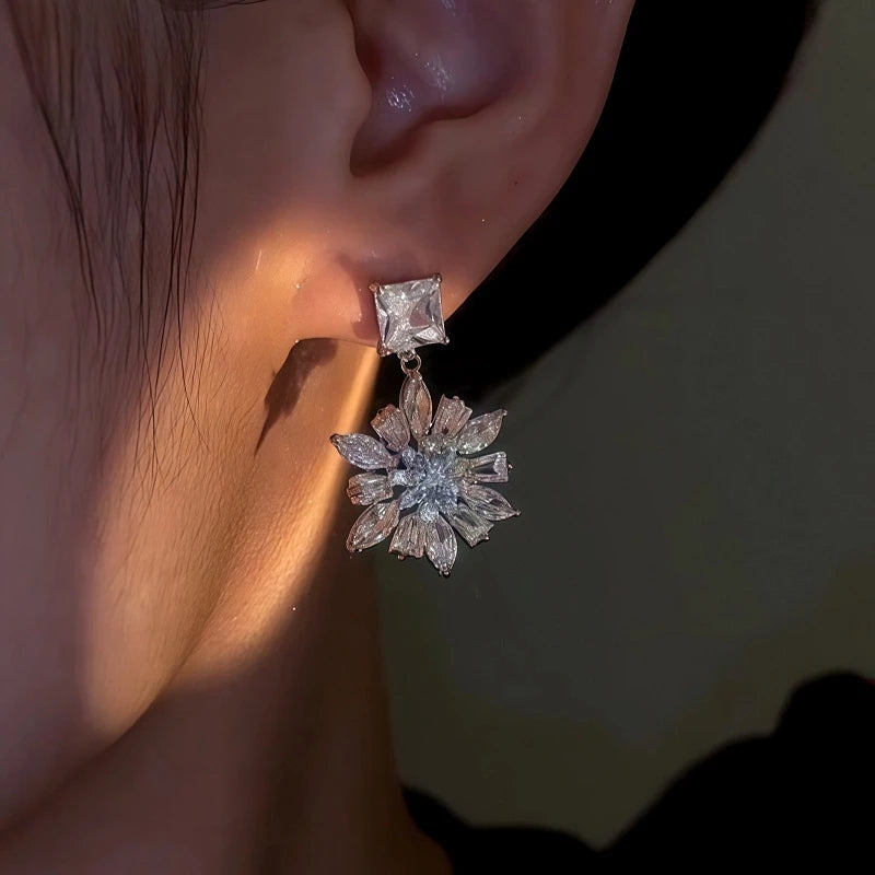 Close-up detail of the sparkling zircons and plating on the Dainty Flower Drop