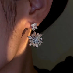 Close-up detail of the sparkling zircons and plating on the Dainty Flower Drop