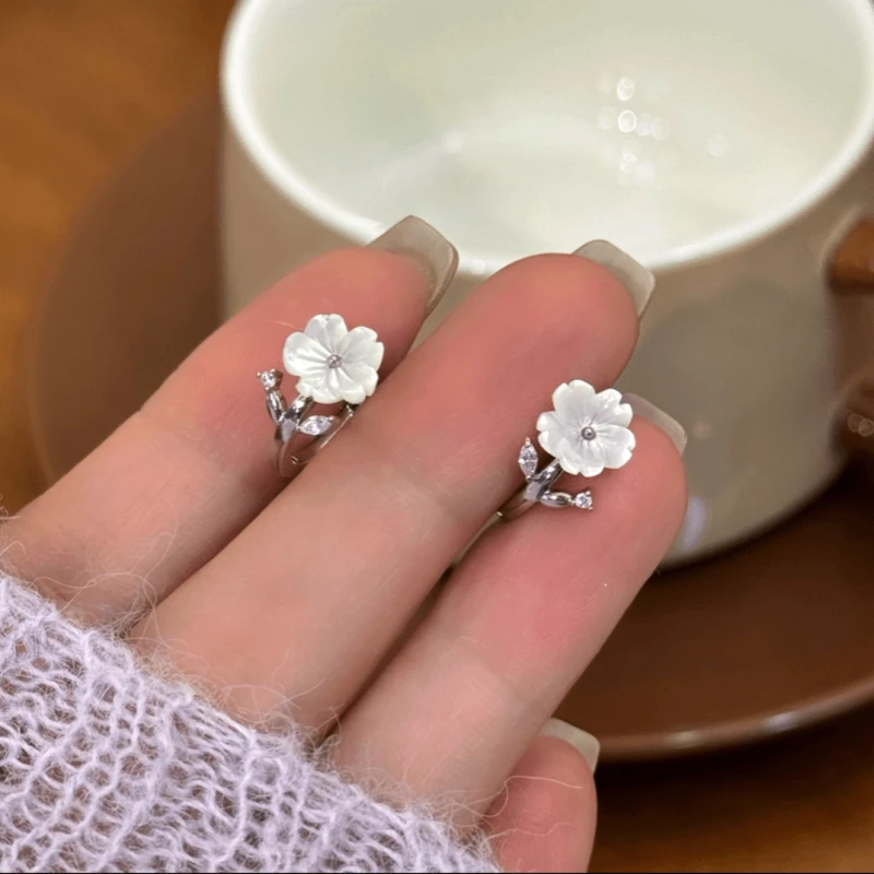 Angled view of the 14K Gold-Plated Zircon Flower Hoop Earrings