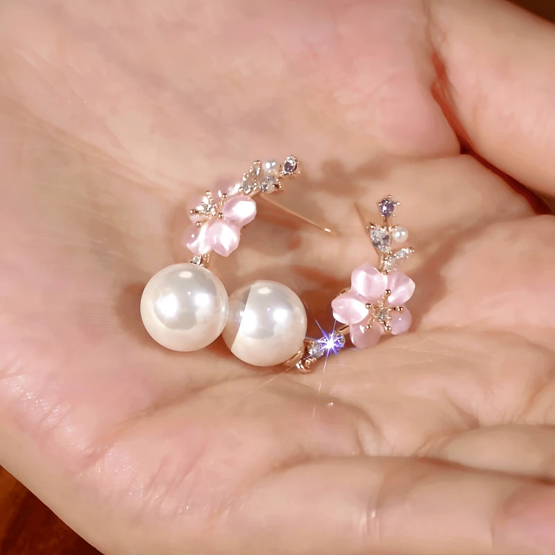 Angled view of the 14K Gold-Plated Zircon Flower Pearl Earrings