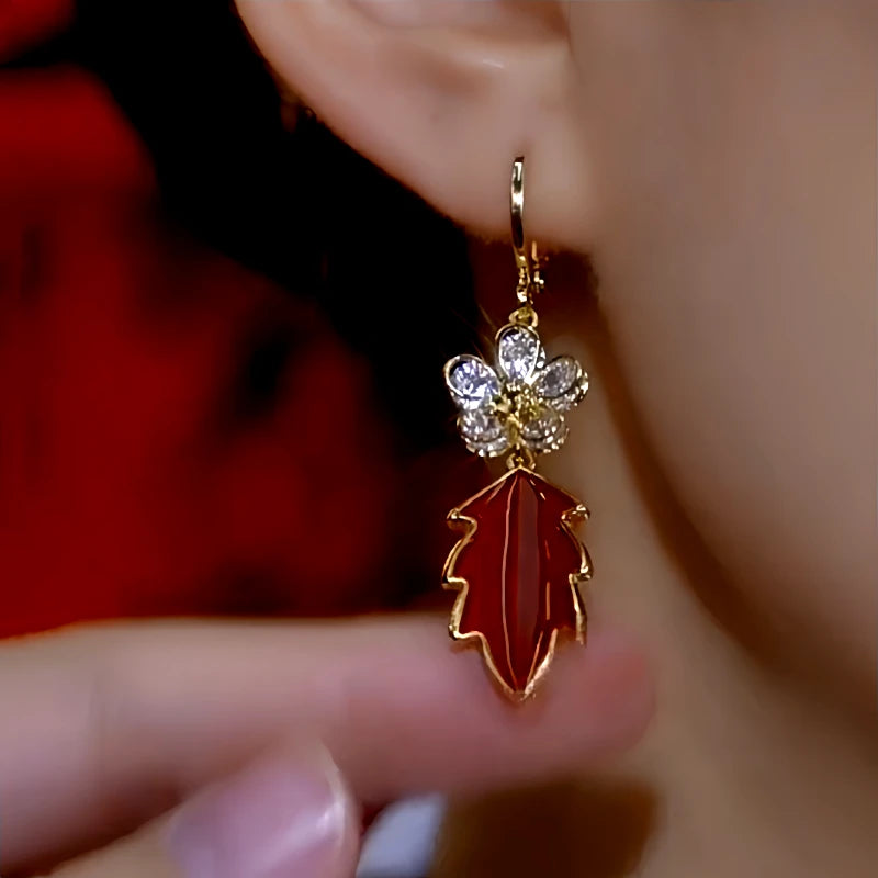 Close-up detail of the sparkling zircons and plating on the Red Leaf Flower