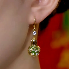 Close-up detail of the sparkling zircons and plating on the Chinese Fortune Earrings