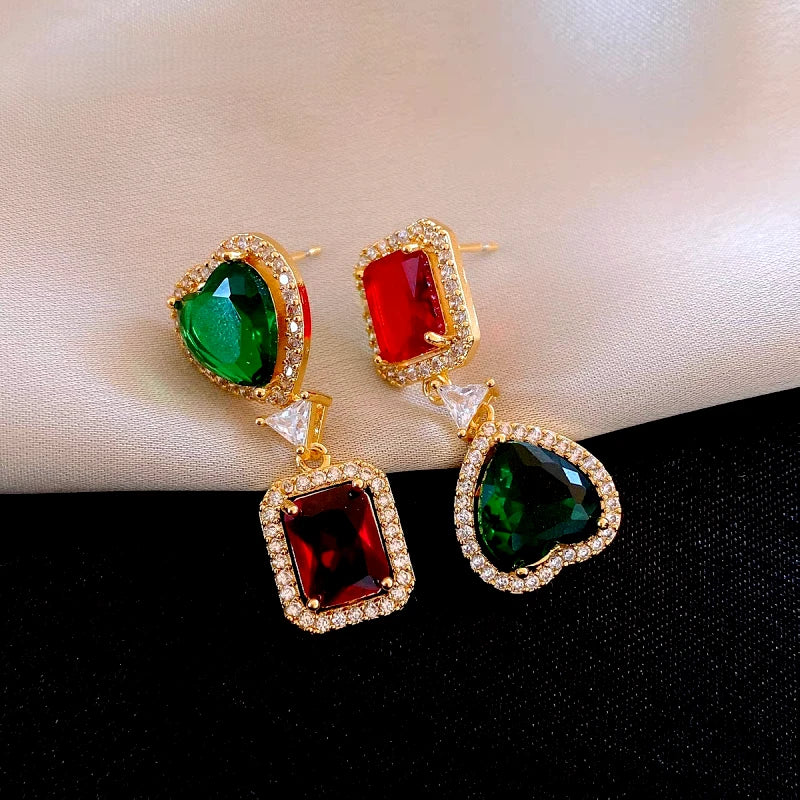 Model showcasing the dangle and style of the 14K Gold-Plated Zircon Geometric Square Heart Earrings
