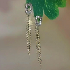 Angled view of the 14K Gold-Plated Zircon Geometric Tassel Earrings