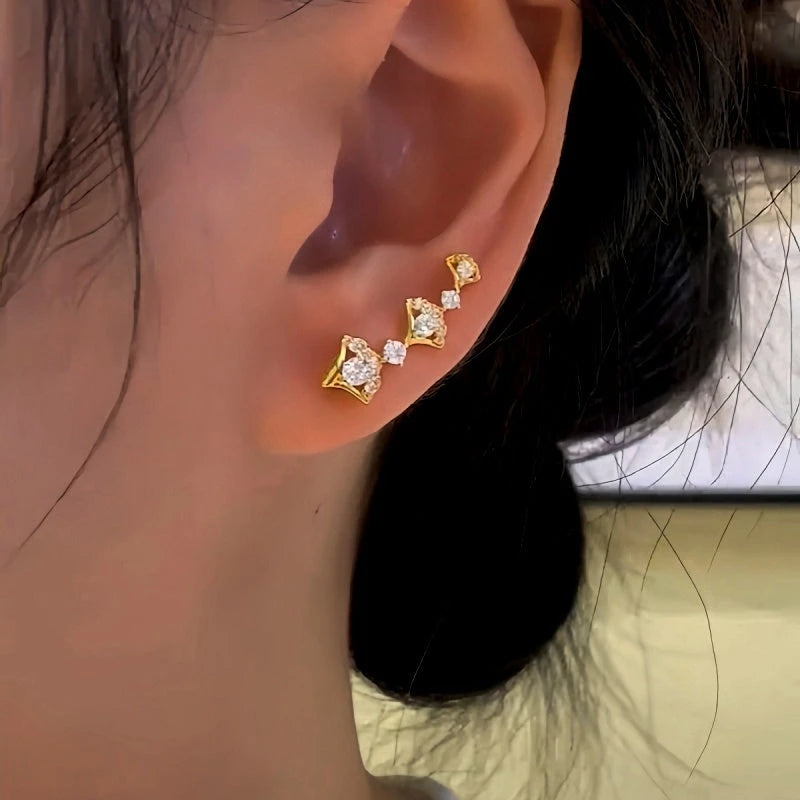 Model showcasing the dangle and style of the 14K Gold-Plated Zircon Ginkgo Leaf Crawlers