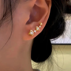 Model showcasing the dangle and style of the 14K Gold-Plated Zircon Ginkgo Leaf Crawlers