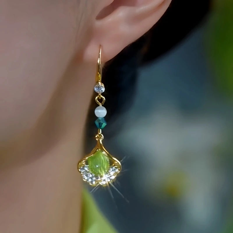 Close-up detail of the sparkling zircons and plating on the Ginkgo Leaf Ear Hooks
