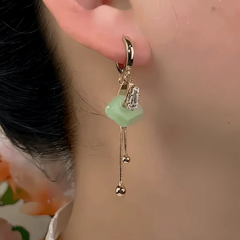 Close-up detail of the sparkling zircons and plating on the Dainty Gourd Studs