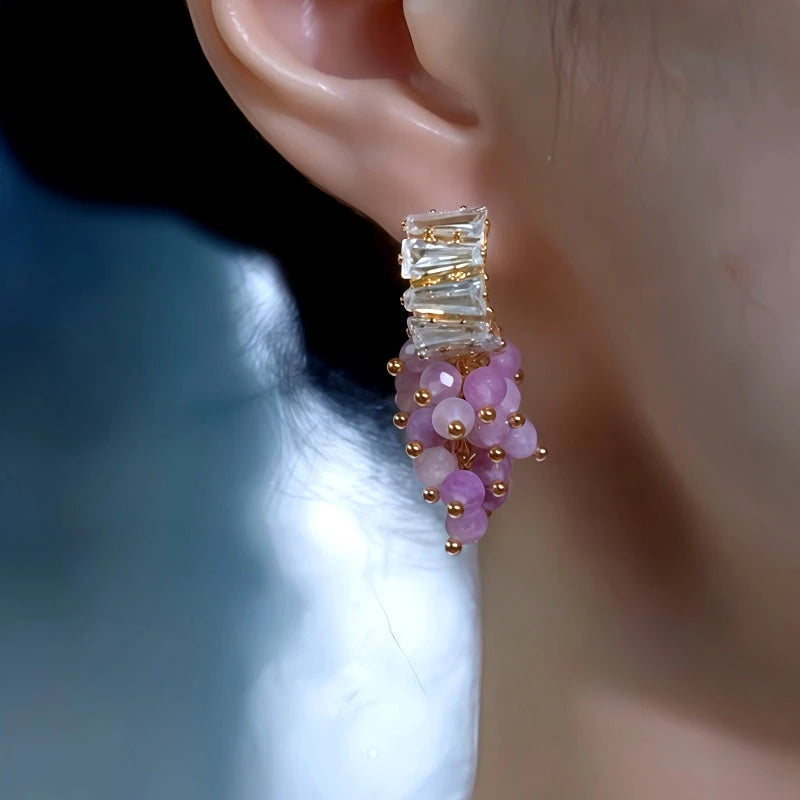 Close-up detail of the sparkling zircons and plating on the Grape Tassel Earrings