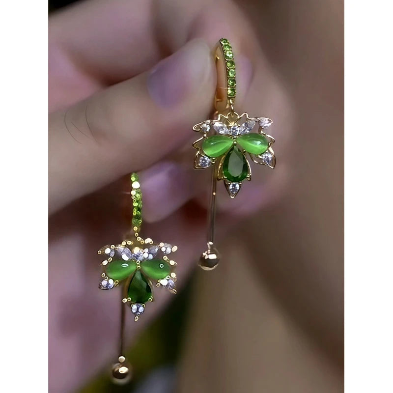 Close-up detail of the sparkling zircons and plating on the Cat's Eye Maple Leaf