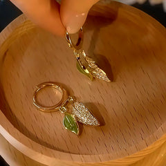 Close-up detail of the sparkling zircons and plating on the Green Leaf Drops