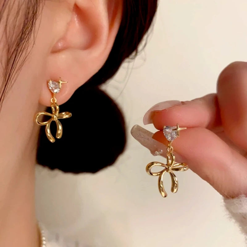 Close-up detail of the sparkling zircons and plating on the Heart Bow Tassel