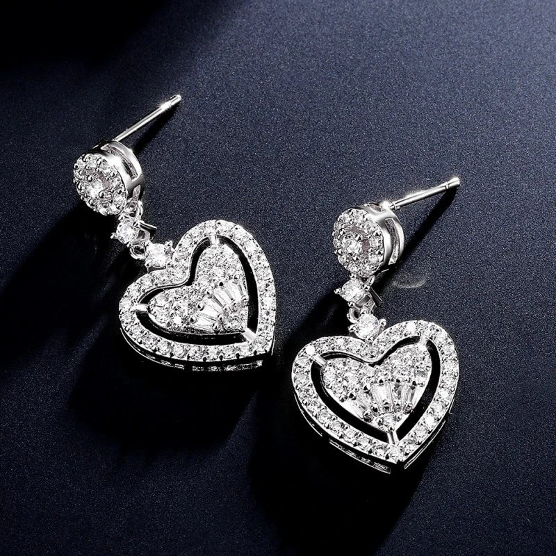 Angled view of the 14K Gold-Plated Zircon Heart Earrings