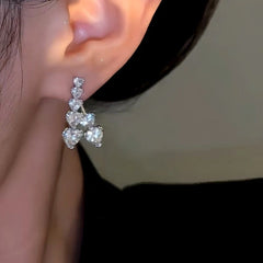 Close-up detail of the sparkling zircons and plating on the Silver Heart Drops
