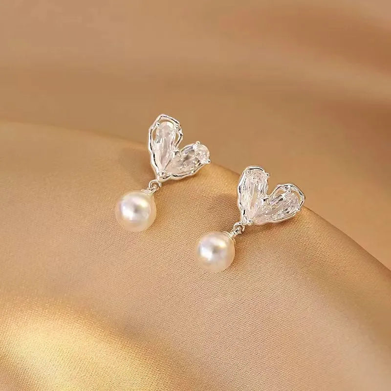 Close-up detail of the sparkling zircons and plating on the Dainty Heart Pearl
