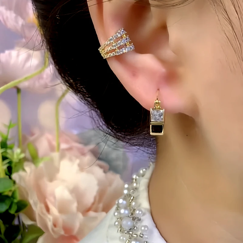 Close-up detail of the sparkling zircons and plating on the Twisted Rope Hoops