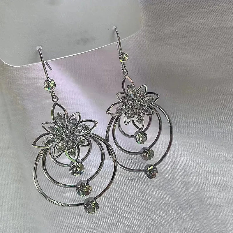 Angled view of the 14K Gold-Plated Zircon Ice Flower Ear Hook Earrings
