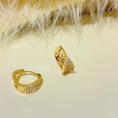 Angled view of the 14K Gold-Plated Zircon Inlaid Leaf Earrings