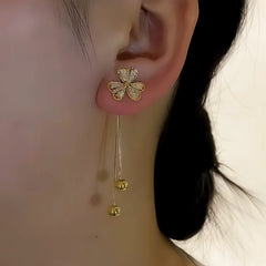 Close-up detail of the sparkling zircons and plating on the Triple Leaf Clover
