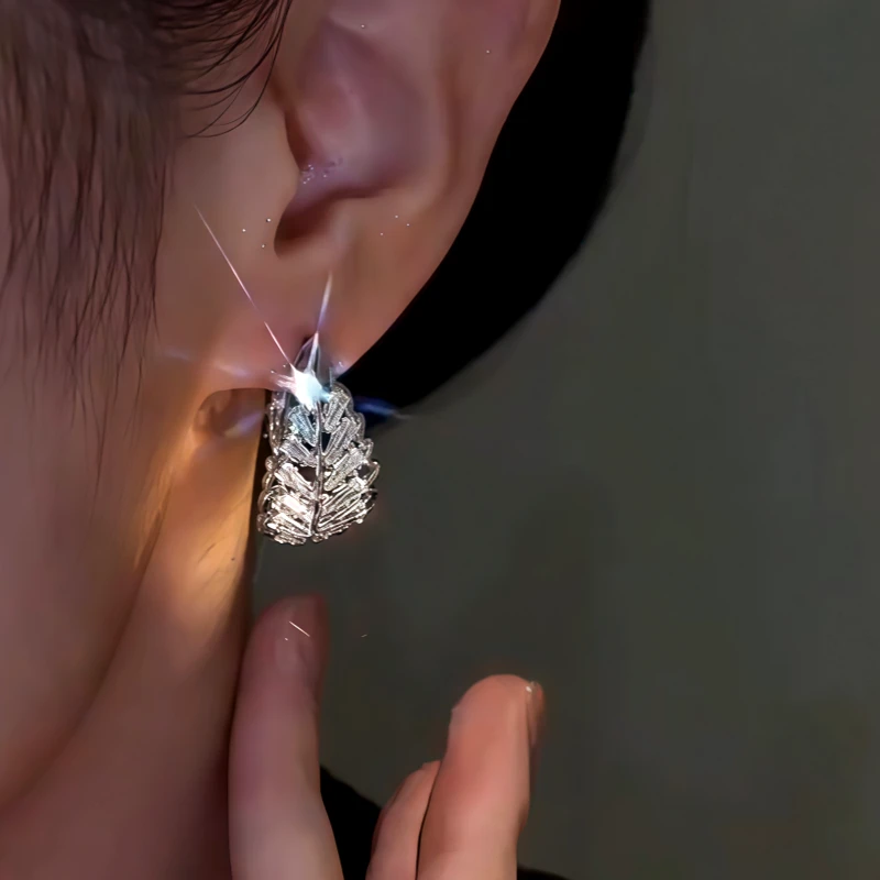 Close-up detail of the sparkling zircons and plating on the Silver Leaf Drops