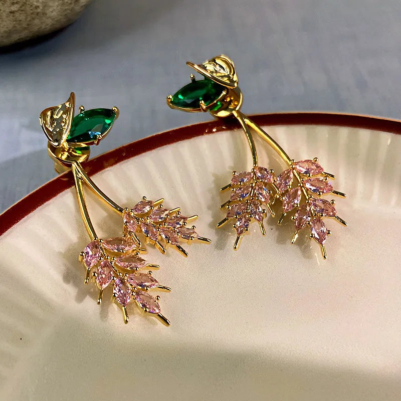 Angled view of the 14K Gold-Plated Zircon Leaf Earrings