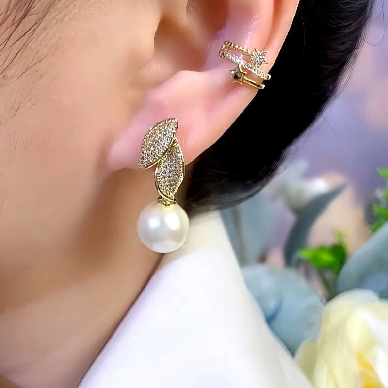 Close-up detail of the sparkling zircons and plating on the Pave Leaf Pearl