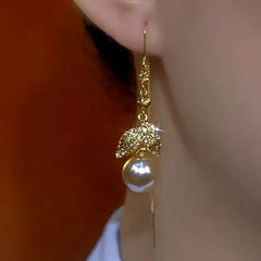 Close-up detail of the sparkling zircons and plating on the Golden Leaf Pearl