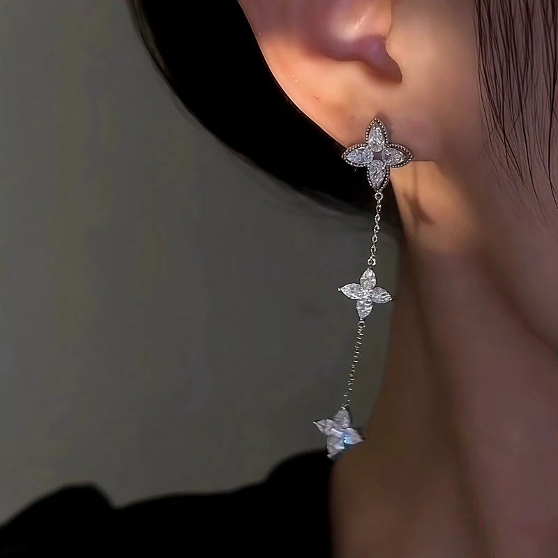 Close-up detail of the sparkling zircons and plating on the Asymmetrical Leaf Tassel