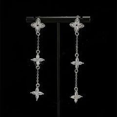 Angled view of the 14K Gold-Plated Zircon Leaf Tassel Earrings