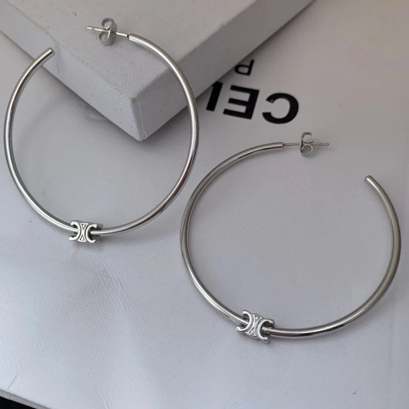 Close-up detail of the sparkling zircons and plating on the Zircon Letter Hoops