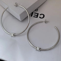 Close-up detail of the sparkling zircons and plating on the Zircon Letter Hoops