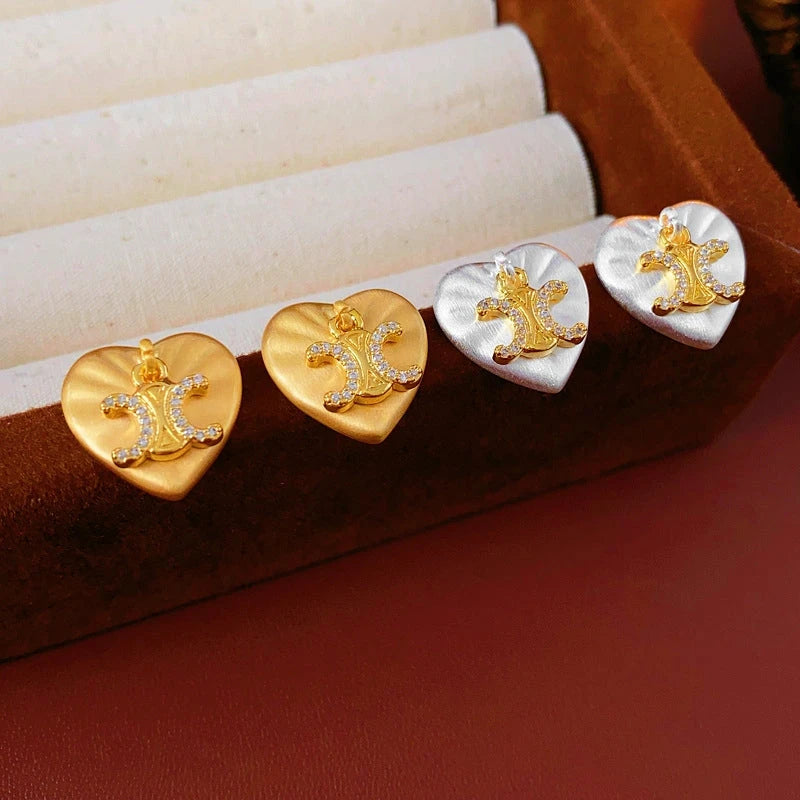 Styling the M Initial Studs for a chic and modern look