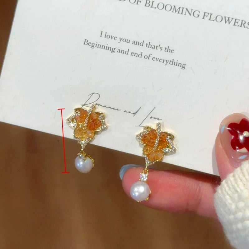 Close-up detail of the sparkling zircons and plating on the Maple Leaf Drops