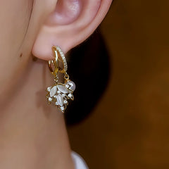 Close-up detail of the sparkling zircons and plating on the Golden Maple Pearl