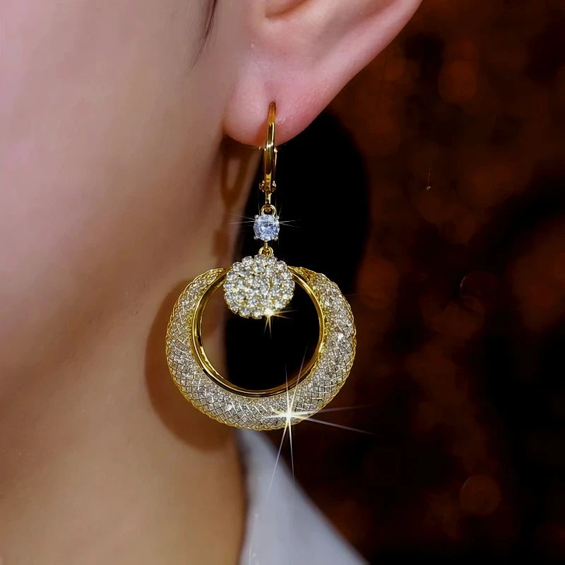 Close-up detail of the sparkling zircons and plating on the Crystal Mesh Hoops