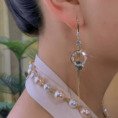Close-up detail of the sparkling zircons and plating on the Celestial Moon Ear Hooks